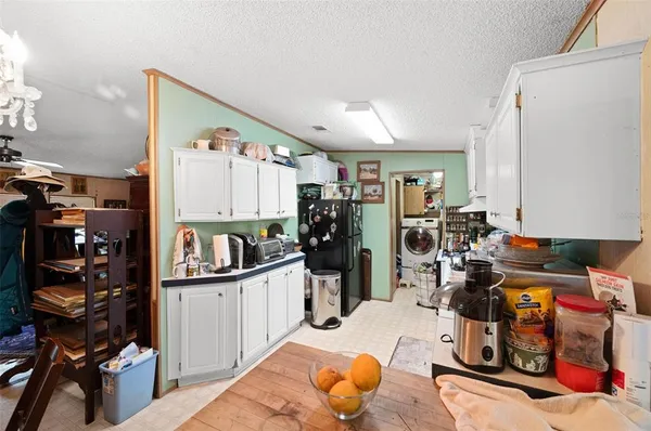 a bedroom with a bed and dresser