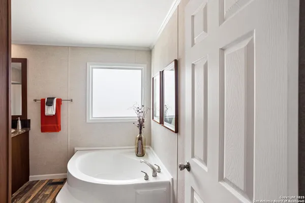 a bathroom with shower and bathtub