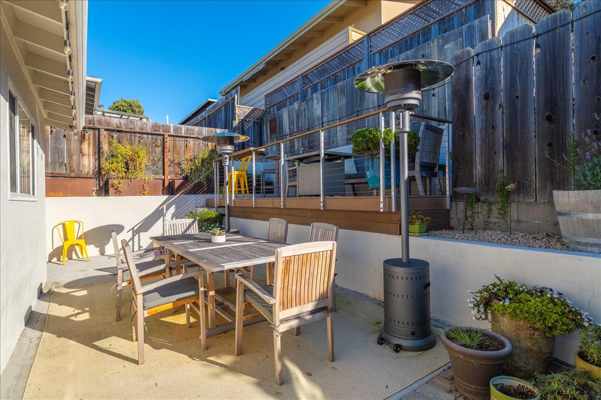 1232 Vallejo Street Seaside, CA 93955 - Photo 36 of 42 a view of an outdoor space with a table and chairs