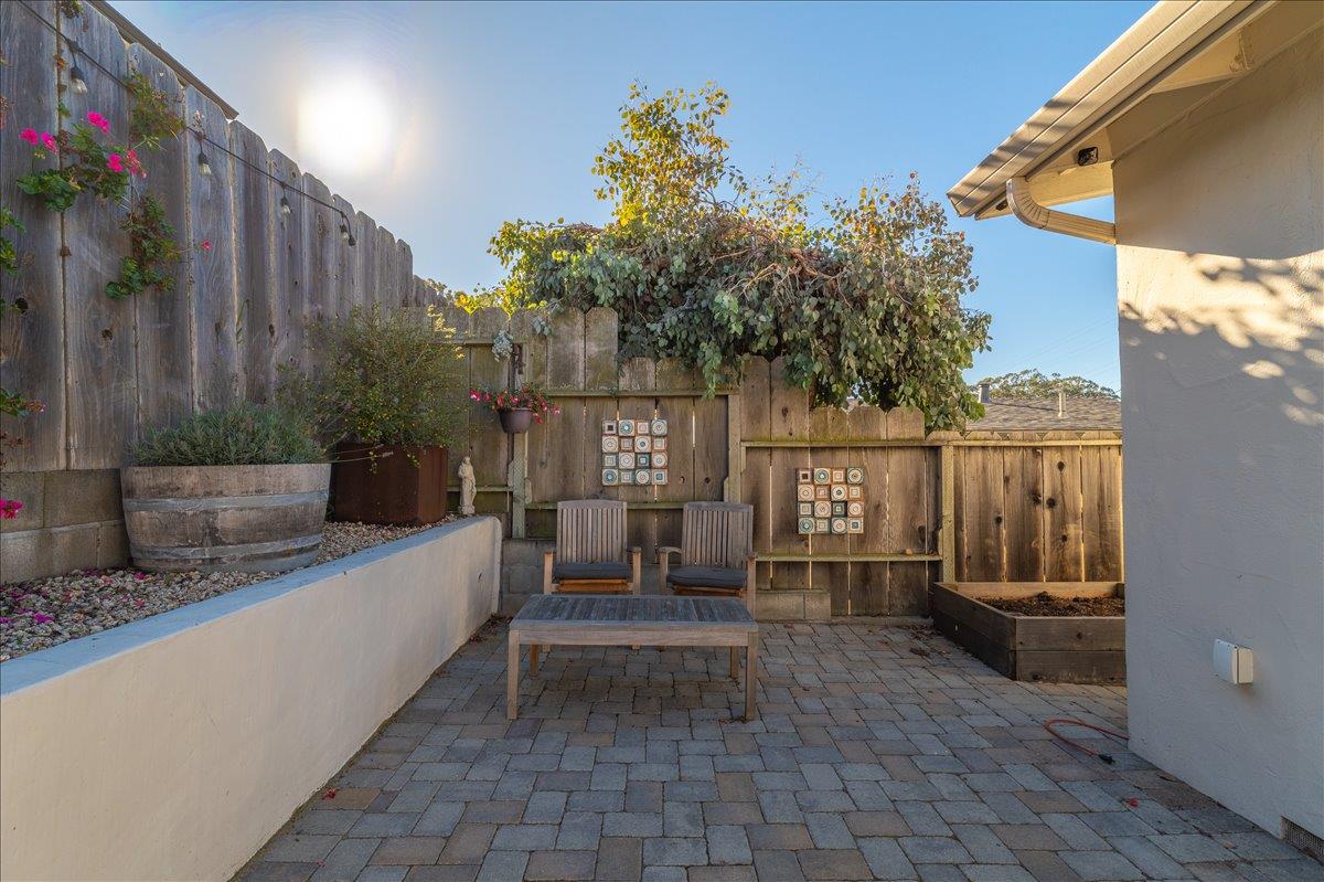 1232 Vallejo Street Seaside, CA 93955 - Photo 41 of 42 a view of a patio with couches and potted plants