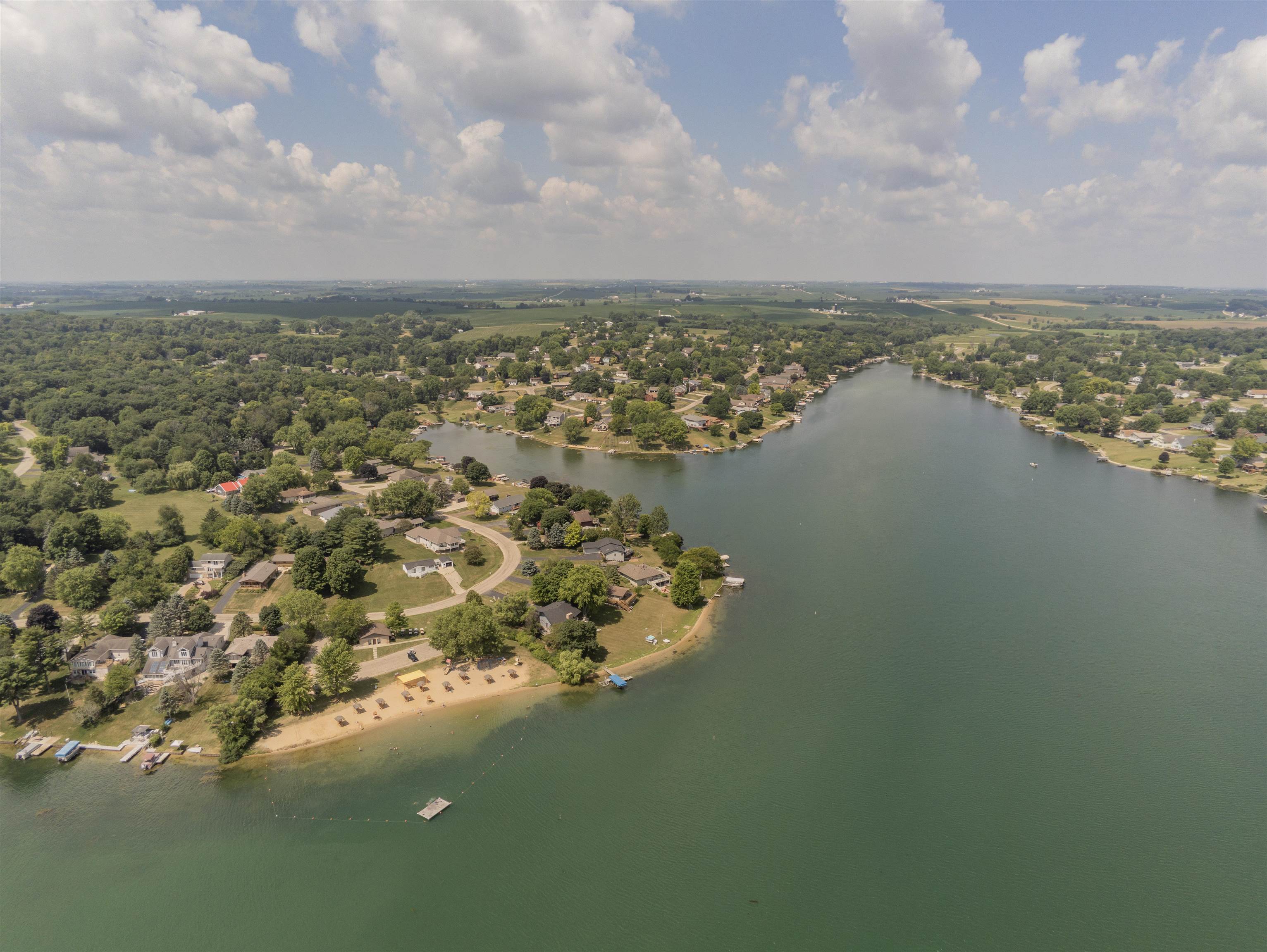 1408 Pier Drive Lake Summerset, IL 61019 - Photo 10 of 20 a view of a lake with houses in back