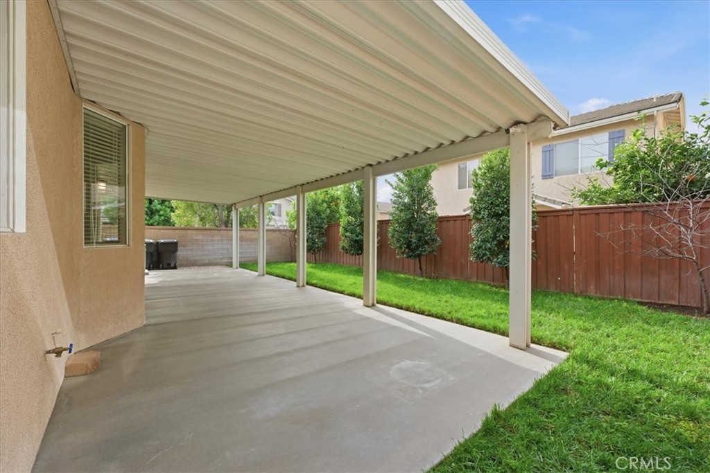 4674 Trailmore Court Riverside, CA 92505 - Photo 31 of 45 a view of a patio with a backyard