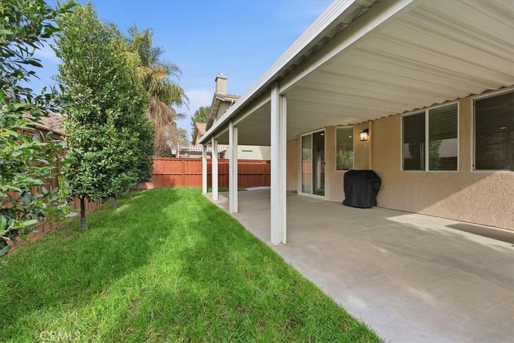 4674 Trailmore Court Riverside, CA 92505 - Photo 33 of 45 a view of a house with backyard and porch