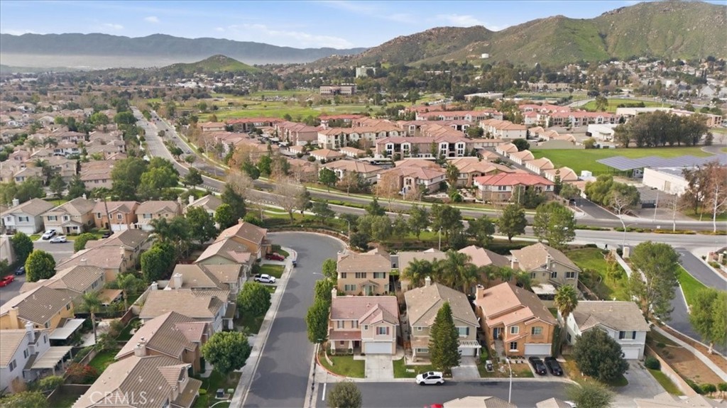 4674 Trailmore Court Riverside, CA 92505 - Photo 41 of 45 an aerial view of residential houses with outdoor space and river