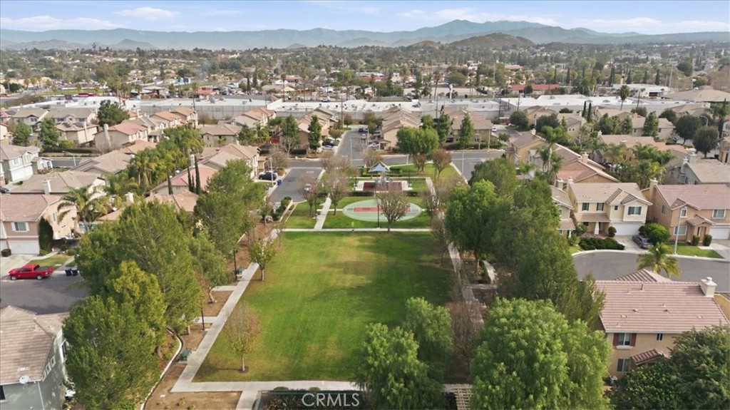 4674 Trailmore Court Riverside, CA 92505 - Photo 43 of 45 an aerial view of residential houses with outdoor space and trees