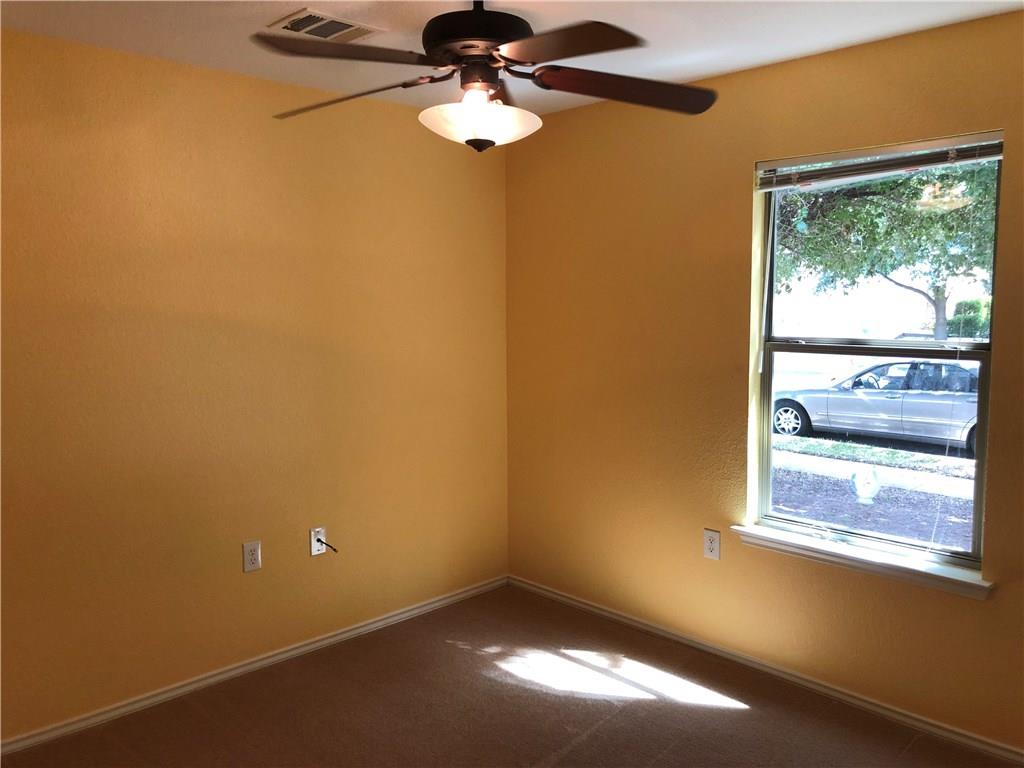 6912 Walkup Lane Austin, TX 78747 - Photo 5 of 14 a view of empty room with window