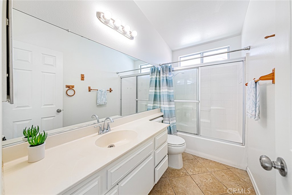 15377 Tobarra Road Fontana, CA 92337 - Photo 29 of 38 Convenient upstairs second bathroom with practical design