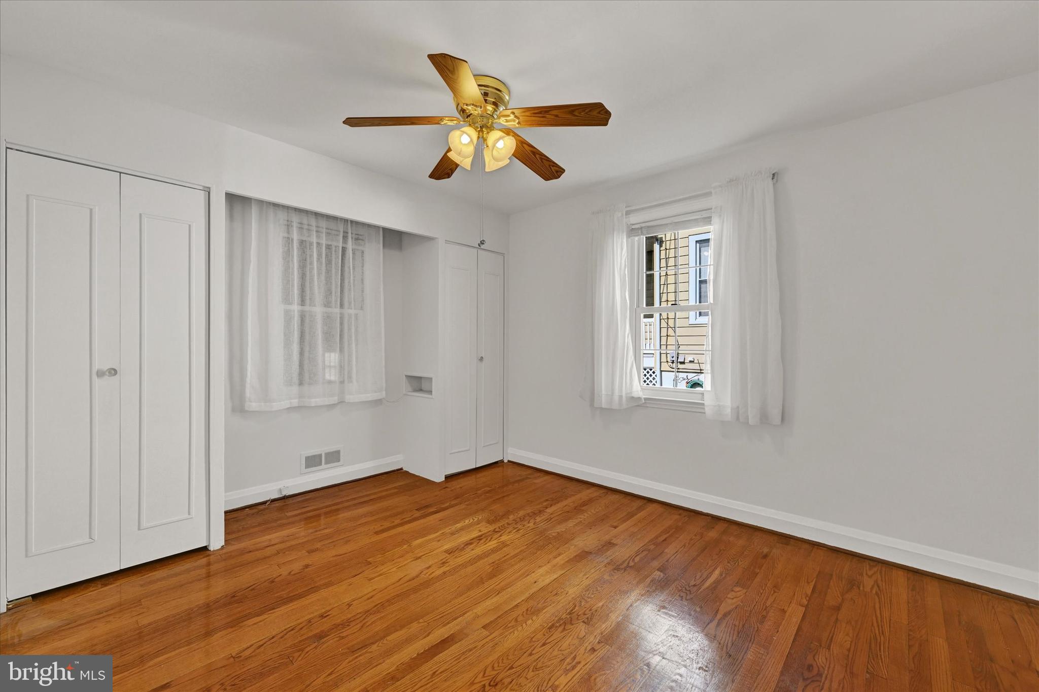 4415 Raspe Avenue Baltimore, MD 21206 - Photo 11 of 28 Main Level Bedroom with Ceiling Fan