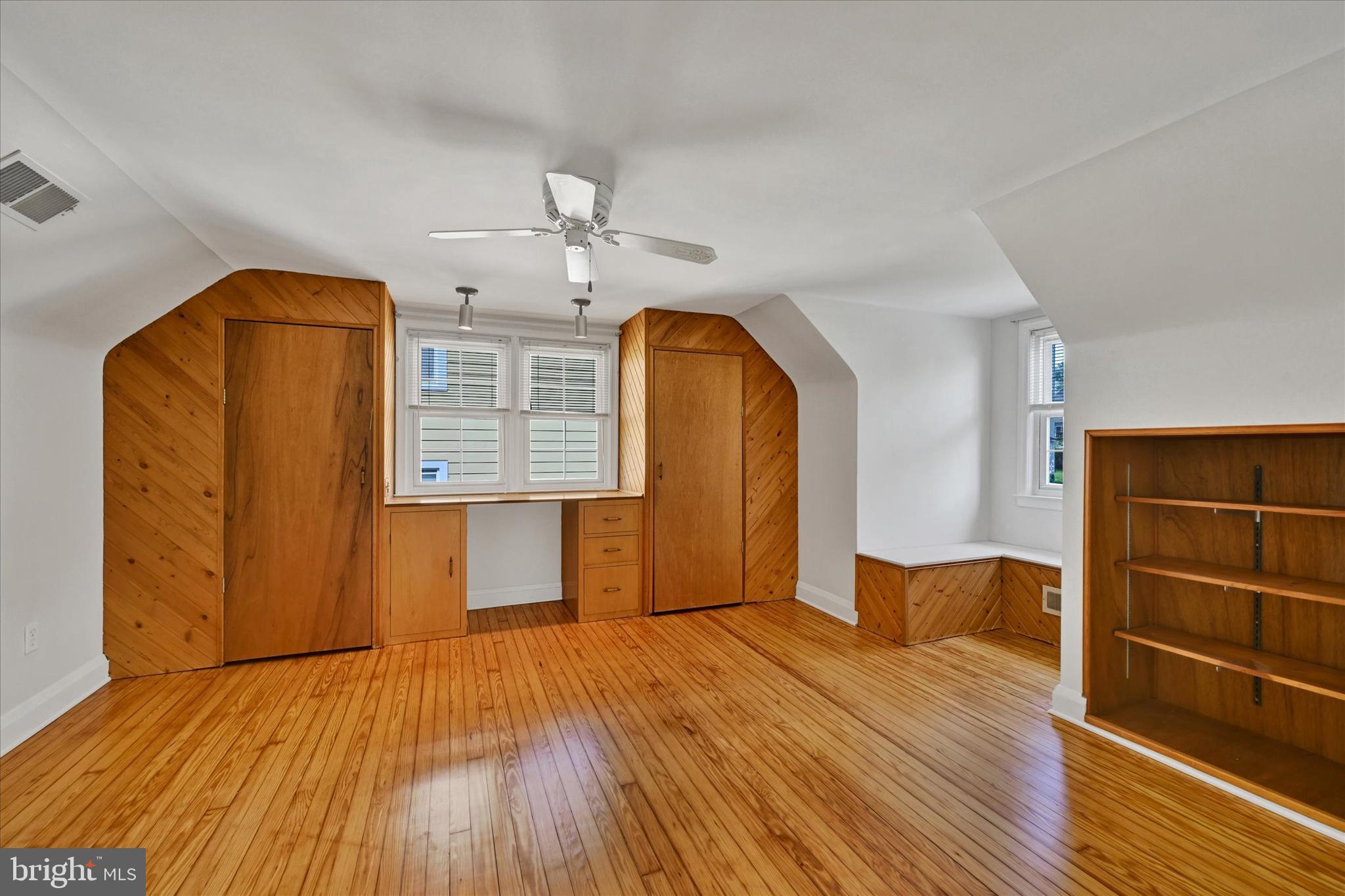4415 Raspe Avenue Baltimore, MD 21206 - Photo 15 of 28 Bedroom 2 with Built-in Desk & Shelving