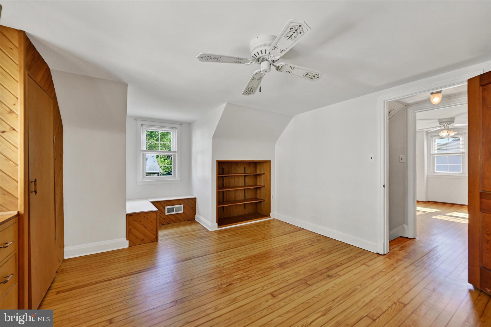 4415 Raspe Avenue Baltimore, MD 21206 - Photo 16 of 28 Bedroom 2 with Hardwood Flooring & Ceiling Fan