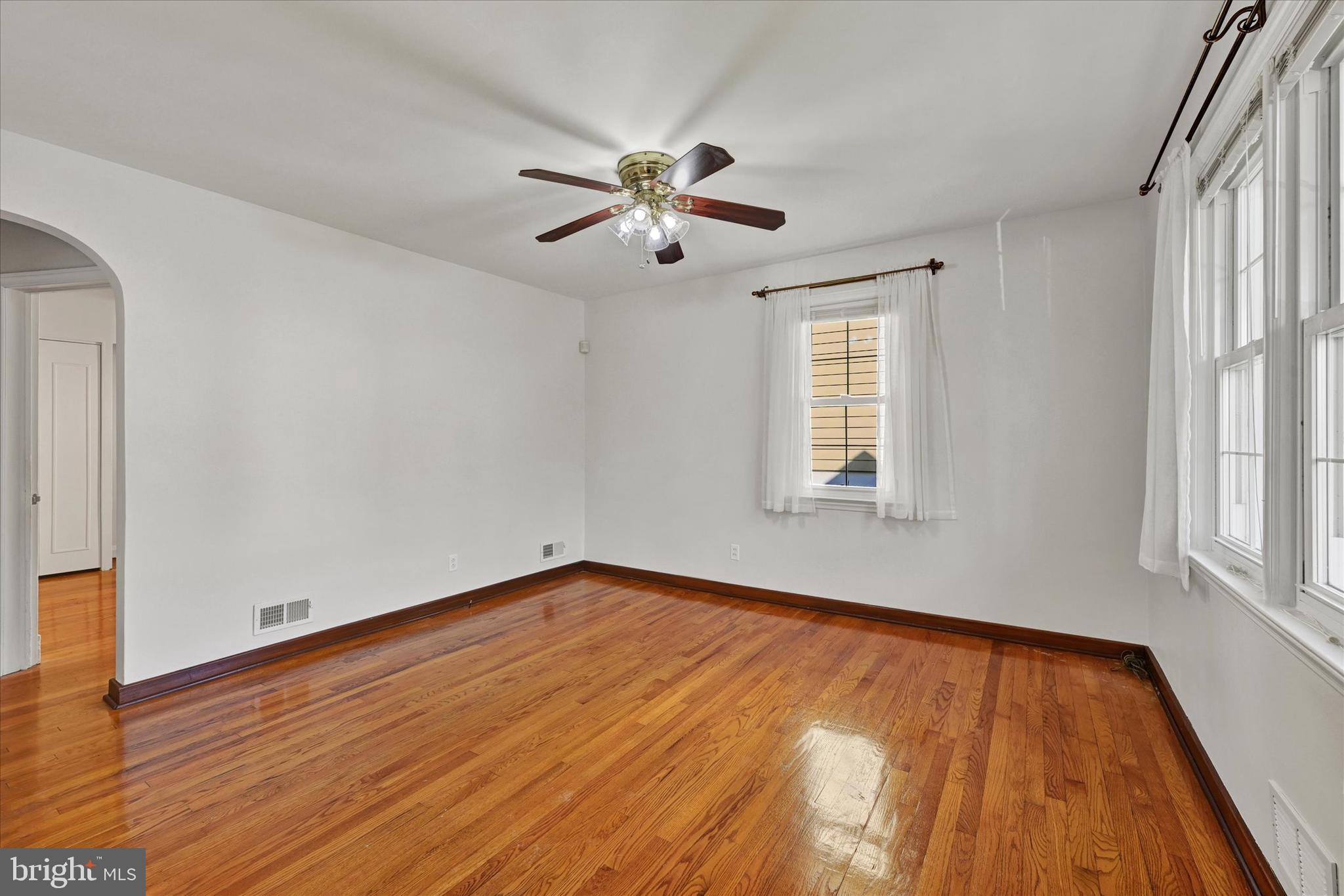 4415 Raspe Avenue Baltimore, MD 21206 - Photo 2 of 28 Living Room with Hardwood Flooring