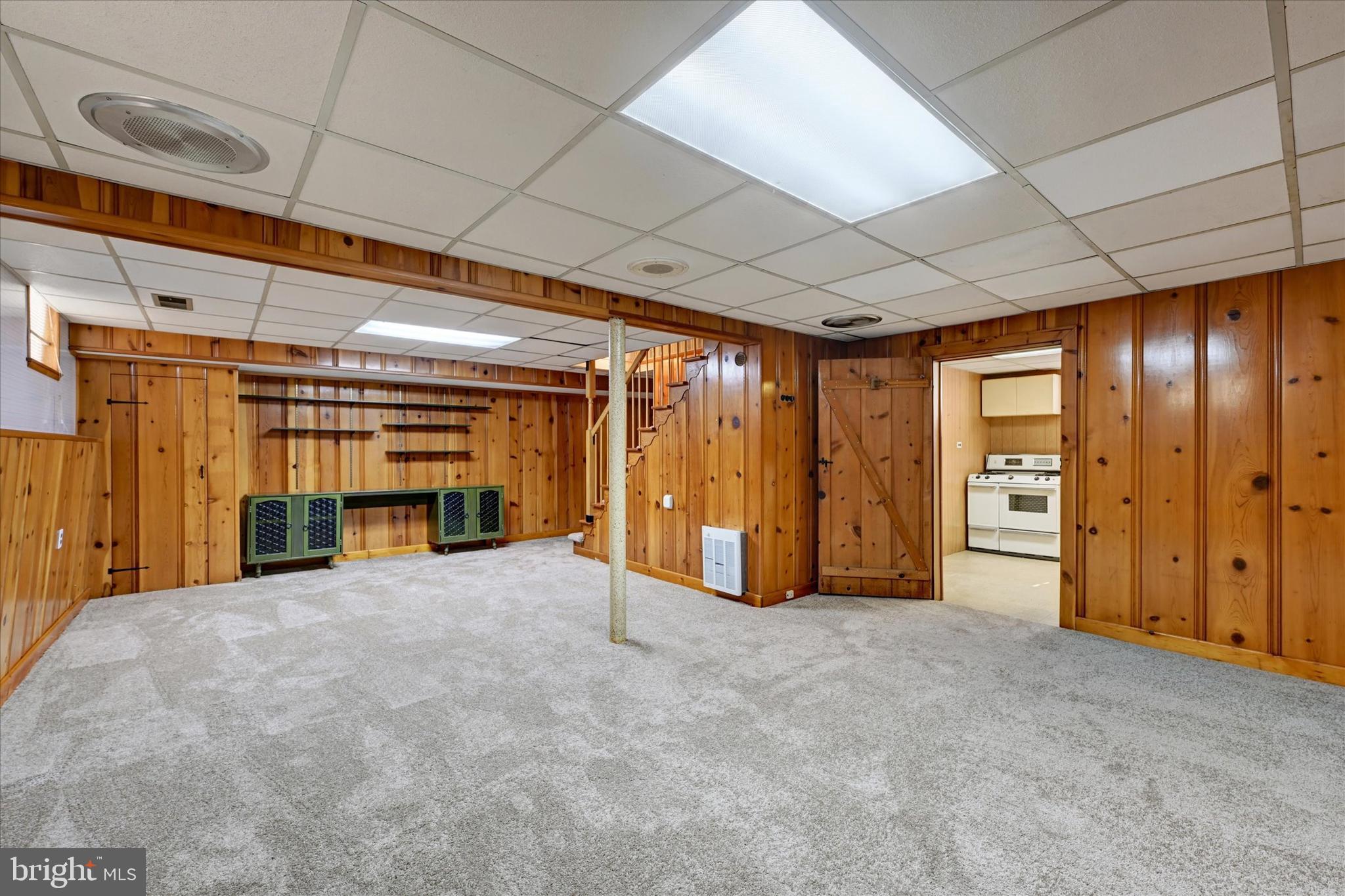 4415 Raspe Avenue Baltimore, MD 21206 - Photo 21 of 28 Recreation Room with New Carpet