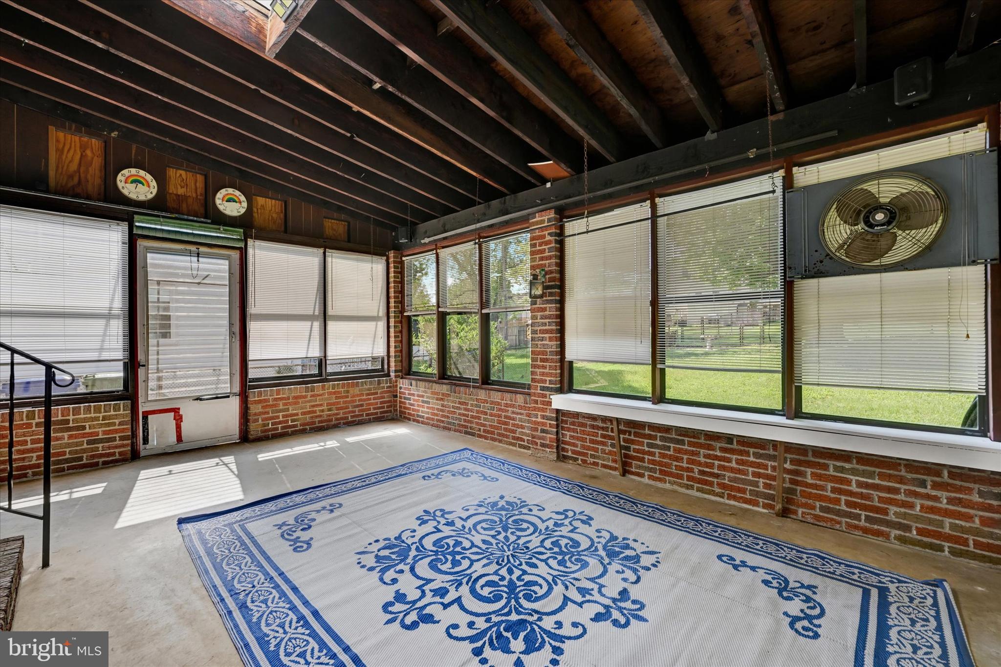 4415 Raspe Avenue Baltimore, MD 21206 - Photo 24 of 28 Spacious Screened-in 3 Season Sun Room