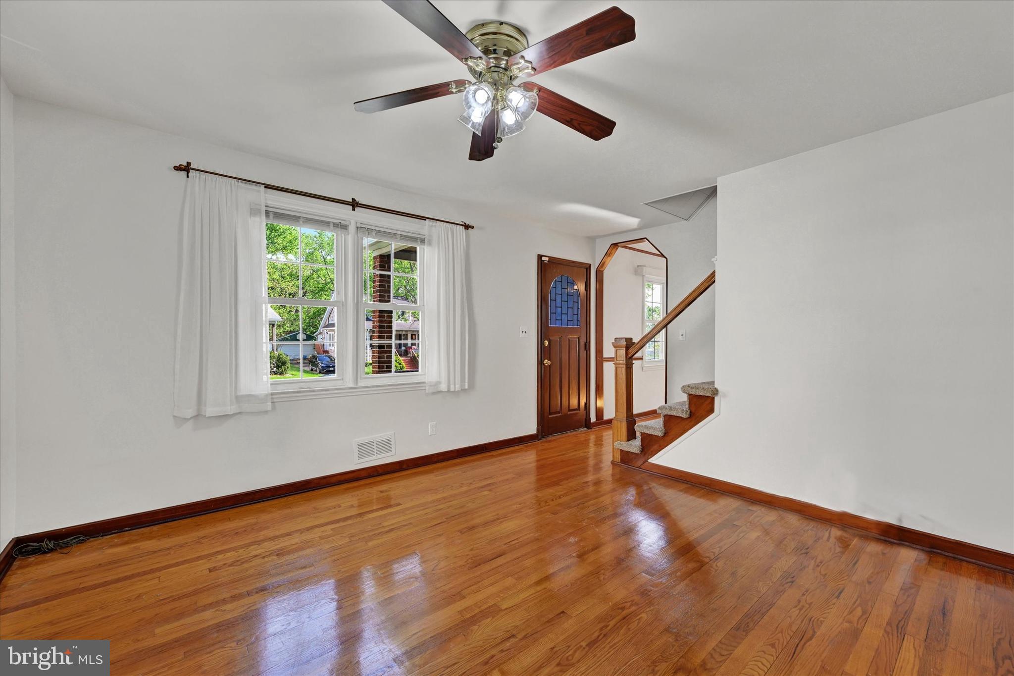 4415 Raspe Avenue Baltimore, MD 21206 - Photo 3 of 28 Living Room with Ceiling Fan