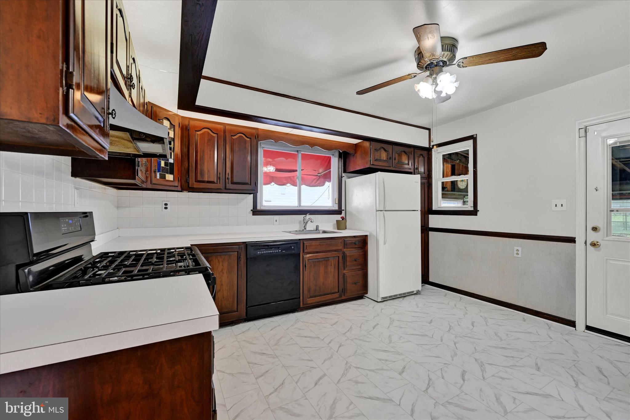 4415 Raspe Avenue Baltimore, MD 21206 - Photo 8 of 28 Kitchen with New Vinyl Flooring
