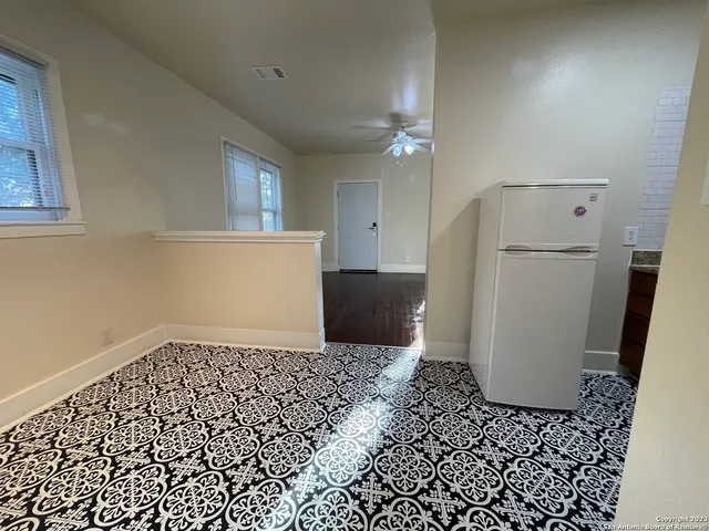 a view of a utility room with a sink