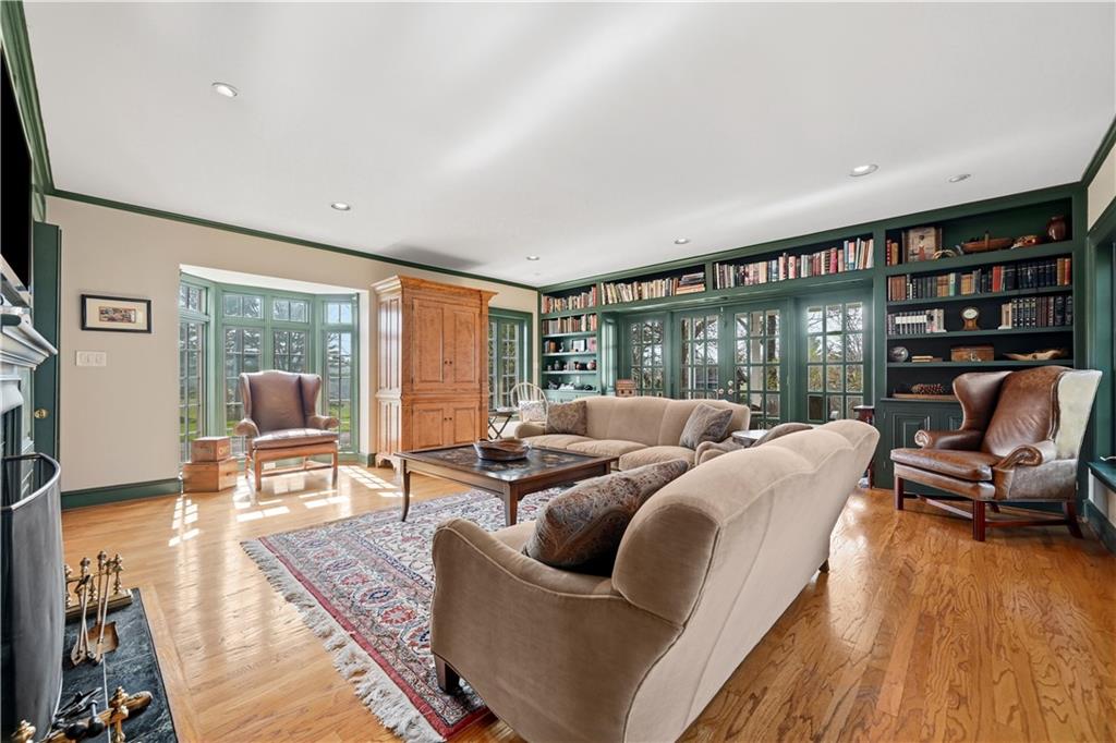 600 Backbone Road Sewickley, PA 15143 - Photo 12 of 50 The family room is warm and inviting, with rich millwork, built-ins, and a comfortable everyday feel. It is a wonderful retreat that balances coziness with architectural character.