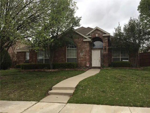 front view of house with a yard