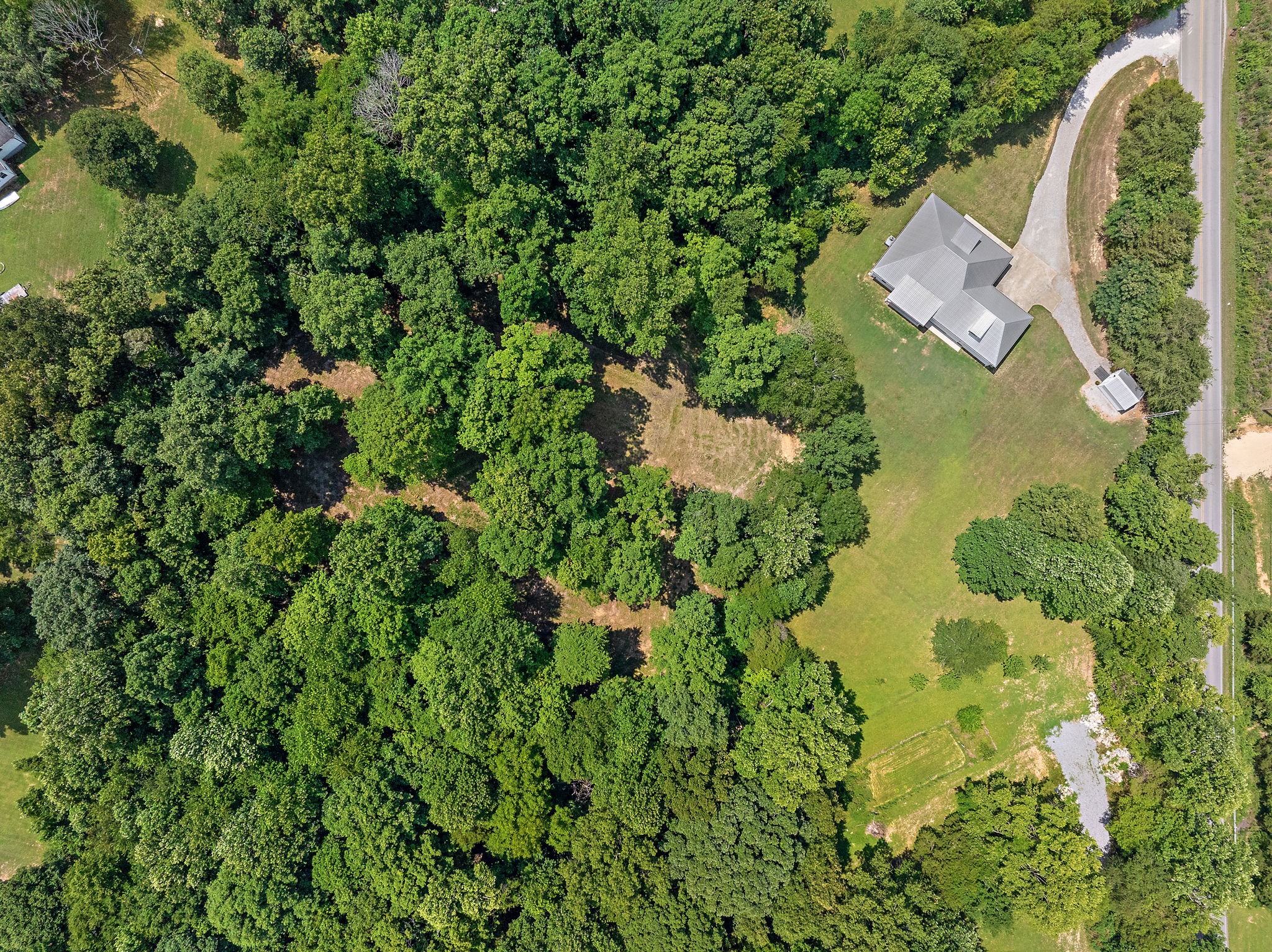 2379 White Bluff Road Burns, TN 37029 - Photo 37 of 40 an aerial view of a house with a yard