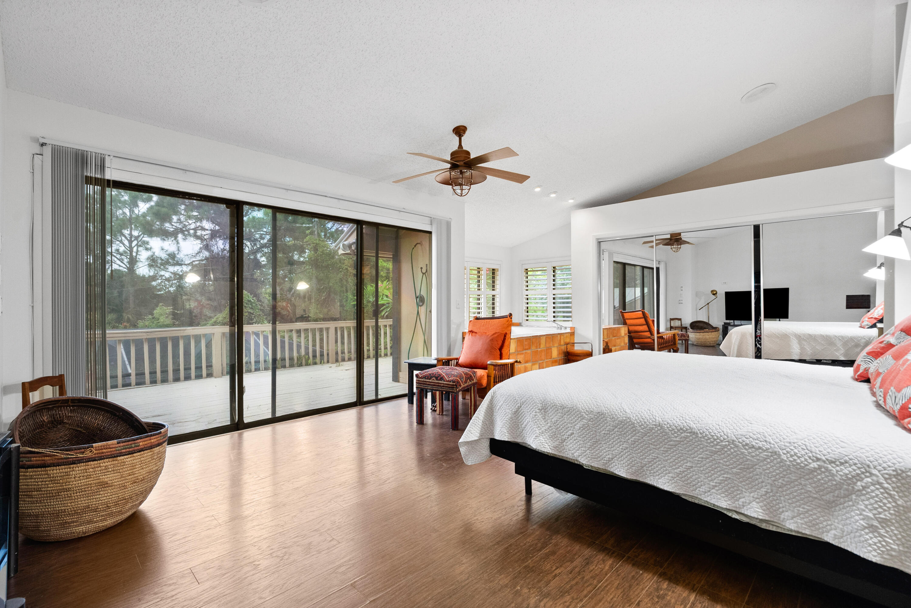 3217 Northwest Perimeter Road Palm City, FL 34990 - Photo 11 of 64 a bed room with a bed and glass chair