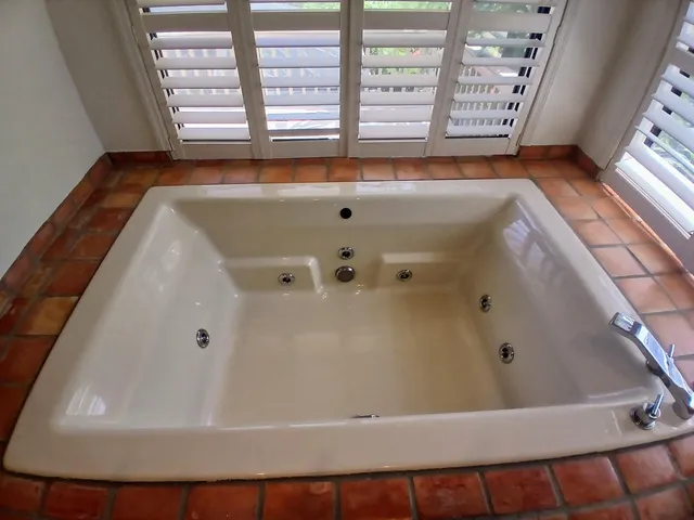 a view of bath tub sitting in a bathroom