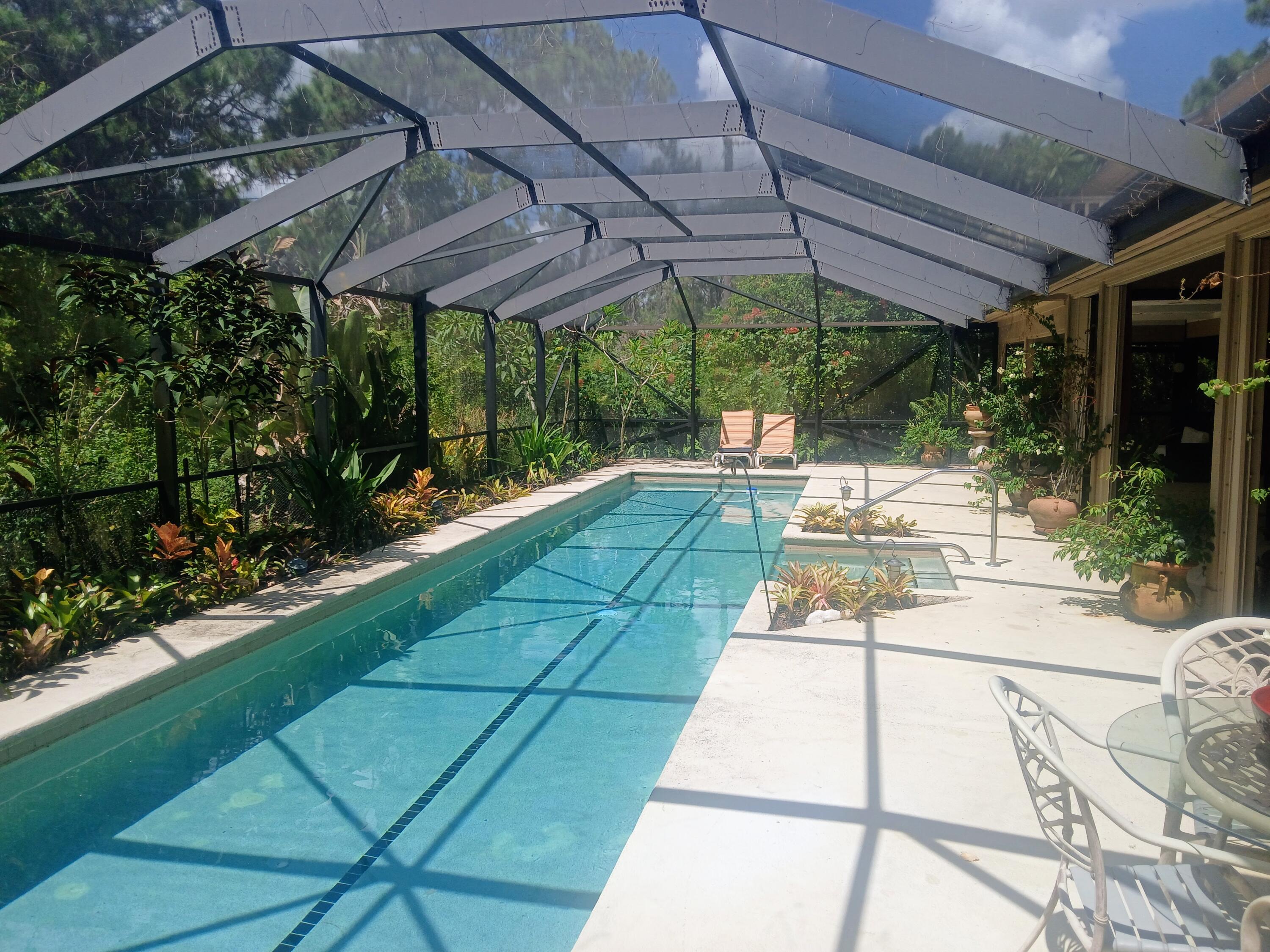 3217 Northwest Perimeter Road Palm City, FL 34990 - Photo 29 of 64 a view of yard with patio