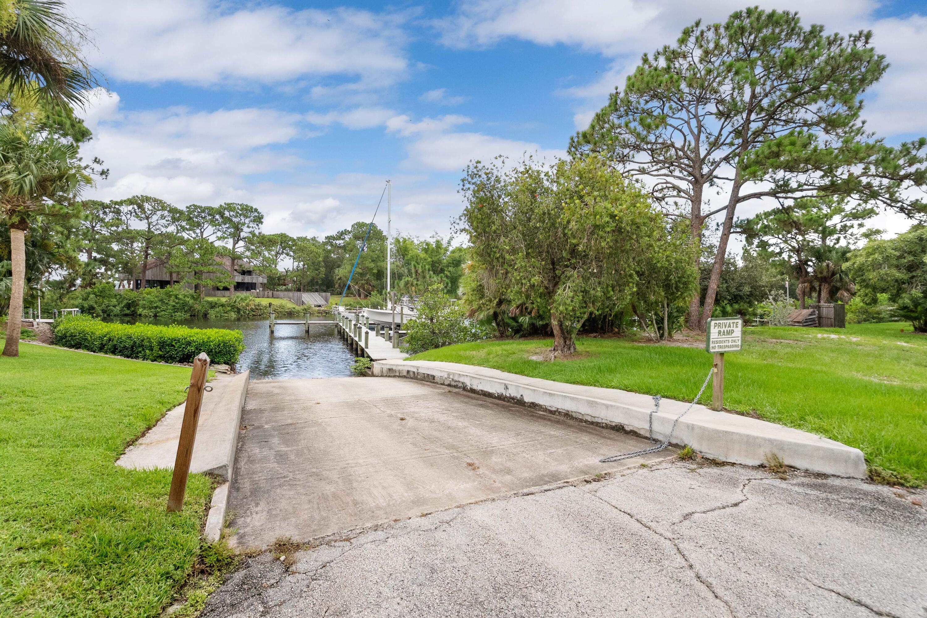 3217 Northwest Perimeter Road Palm City, FL 34990 - Photo 40 of 64 a park view with a garden space