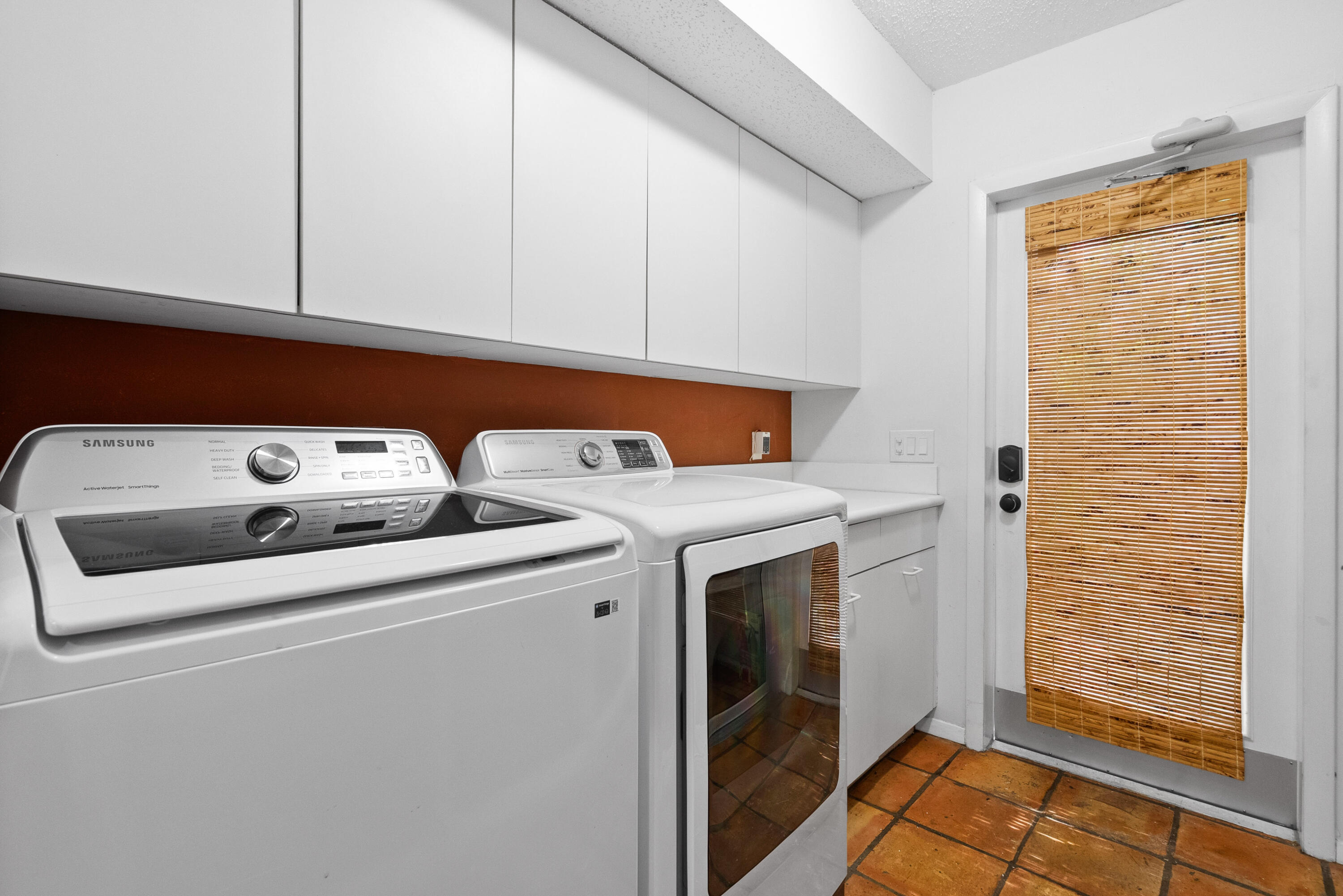 3217 Northwest Perimeter Road Palm City, FL 34990 - Photo 64 of 64 a utility room with dryer and washer