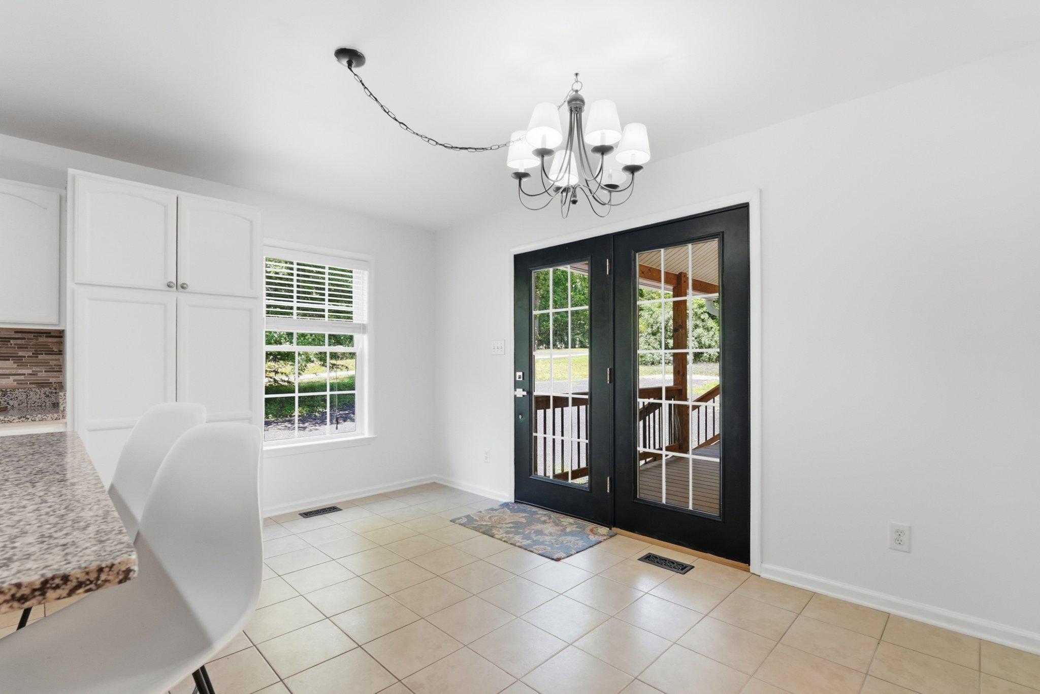 1522 Meander Run Road Locust Dale, VA 22948 - Photo 27 of 72 French door from kitchen to covered porch