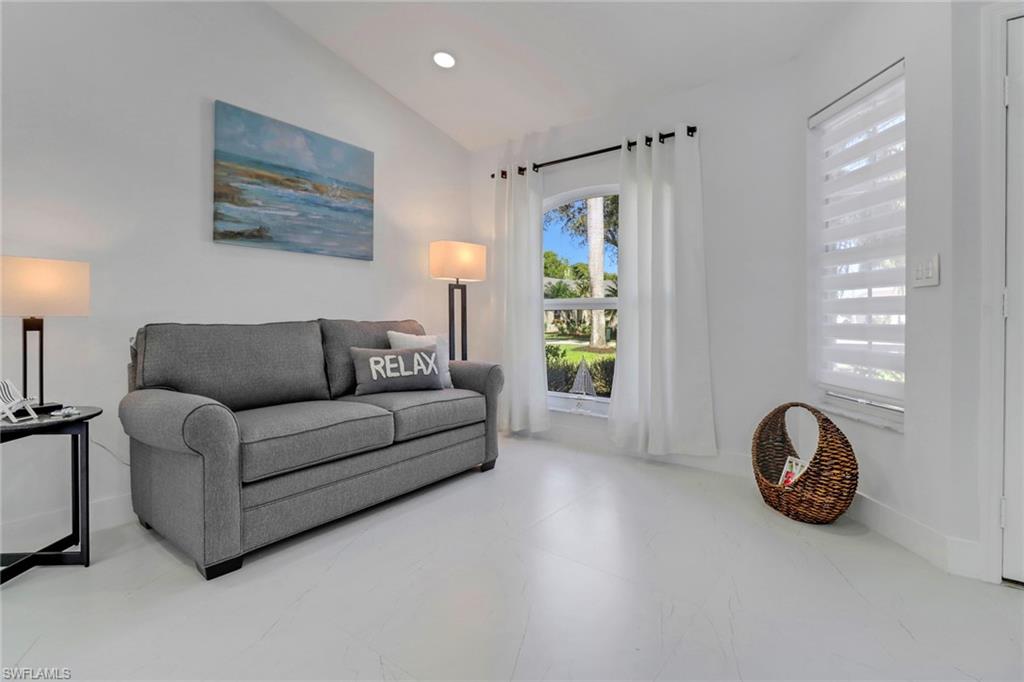172 Plantation Circle Naples, FL 34104 - Photo 3 of 36 a living room with furniture and a window