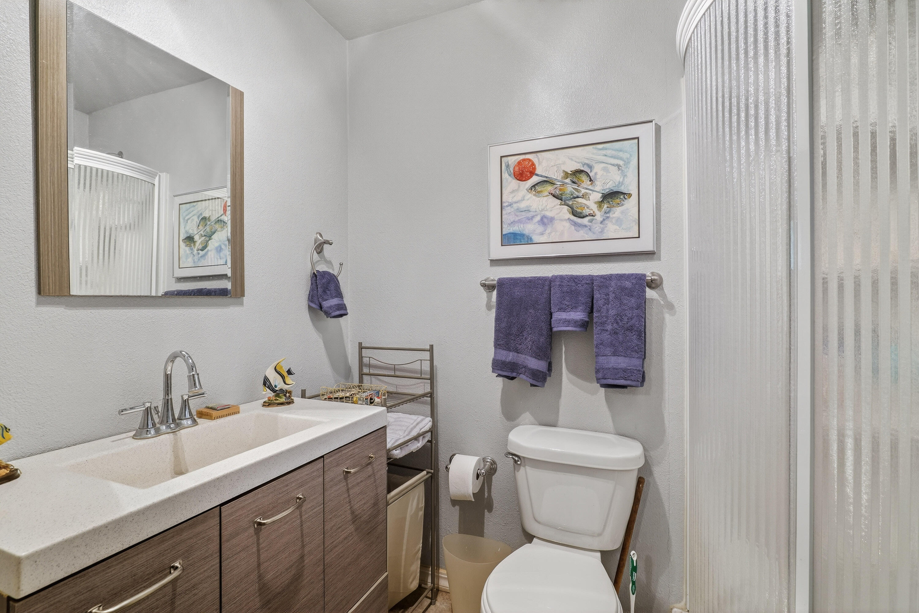 244 Riessen Road Grants Pass, OR 97526 - Photo 25 of 52 a bathroom with a toilet a sink and mirror