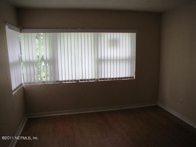 2759 Rainbow Road Jacksonville, FL 32217 - Photo 4 of 14 a view of an empty room with a window