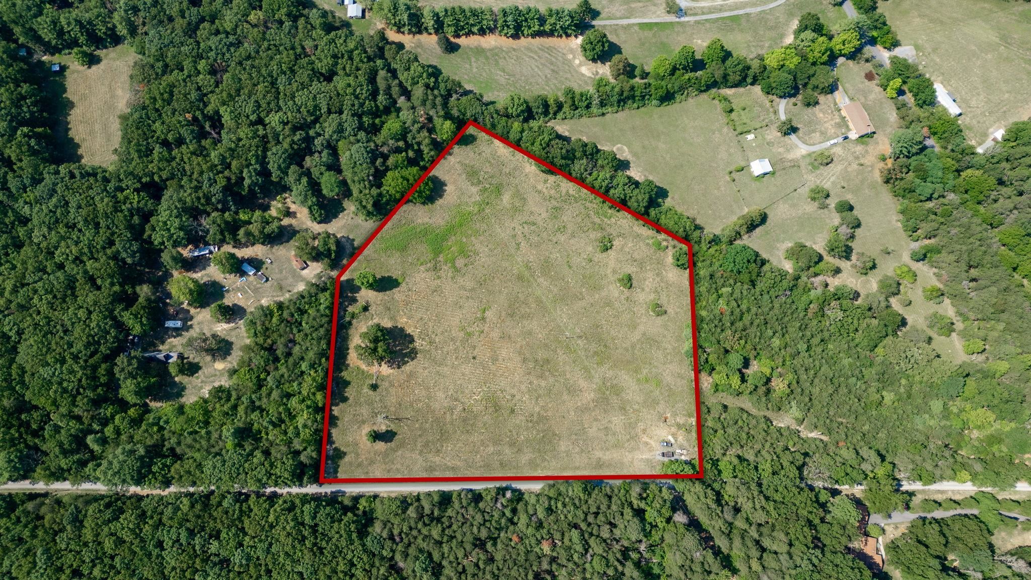 Tbd Shape Shifter Lane Grottoes, VA 24441 - Photo 1 of 6 an aerial view of a house with a yard and plants