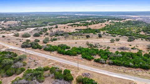 an aerial view of residential house with outdoor space