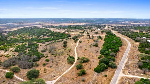 an aerial view of residential house with outdoor space