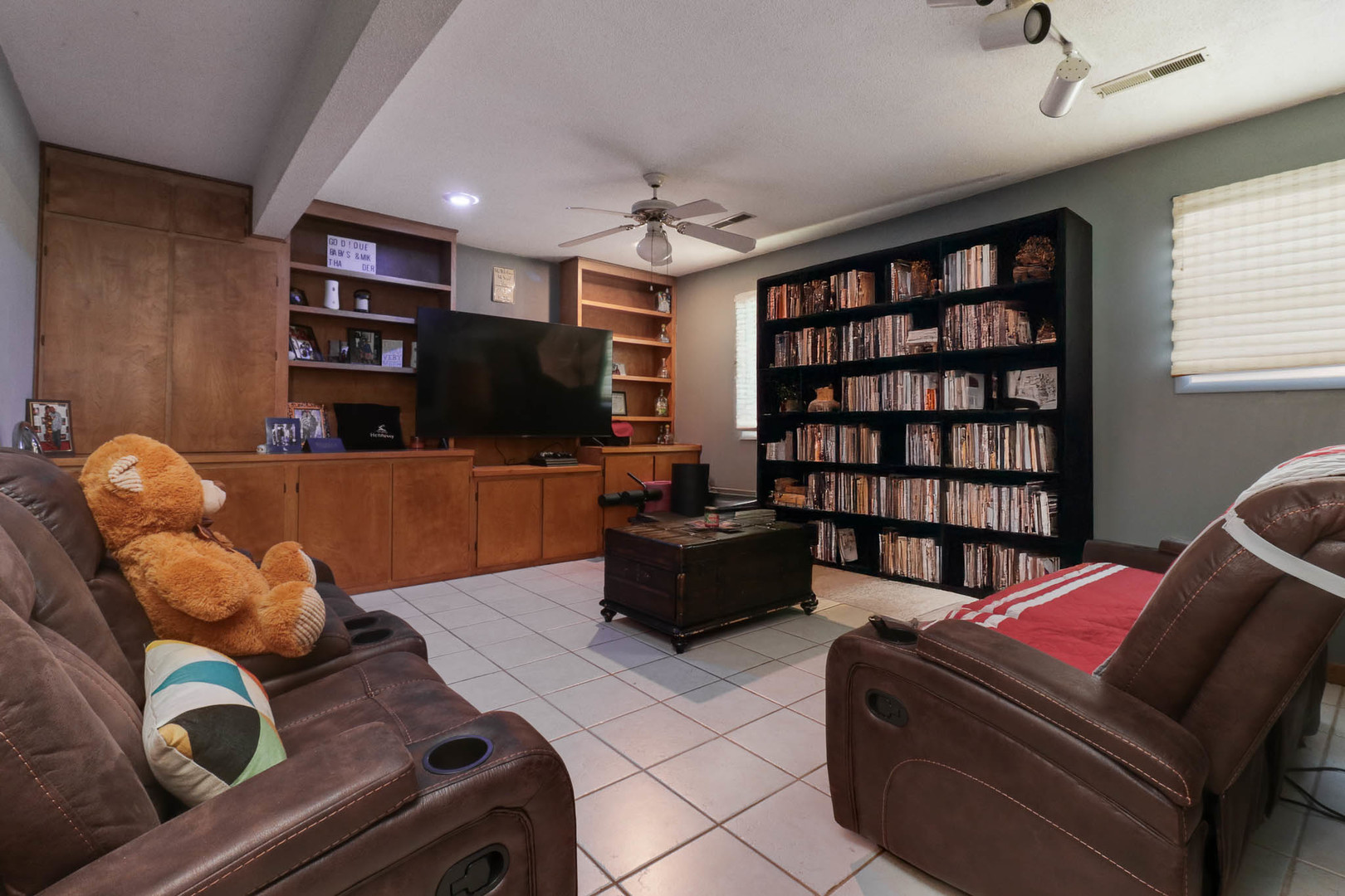 203 Edwards Drive Normal, IL 61761 - Photo 12 of 28 a living room with furniture and a flat screen tv