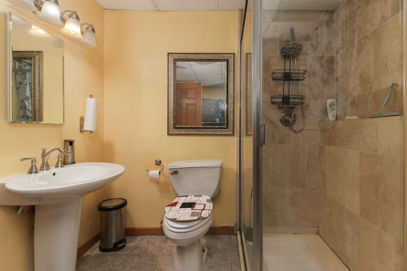 203 Edwards Drive Normal, IL 61761 - Photo 16 of 28 a bathroom with a toilet sink and shower