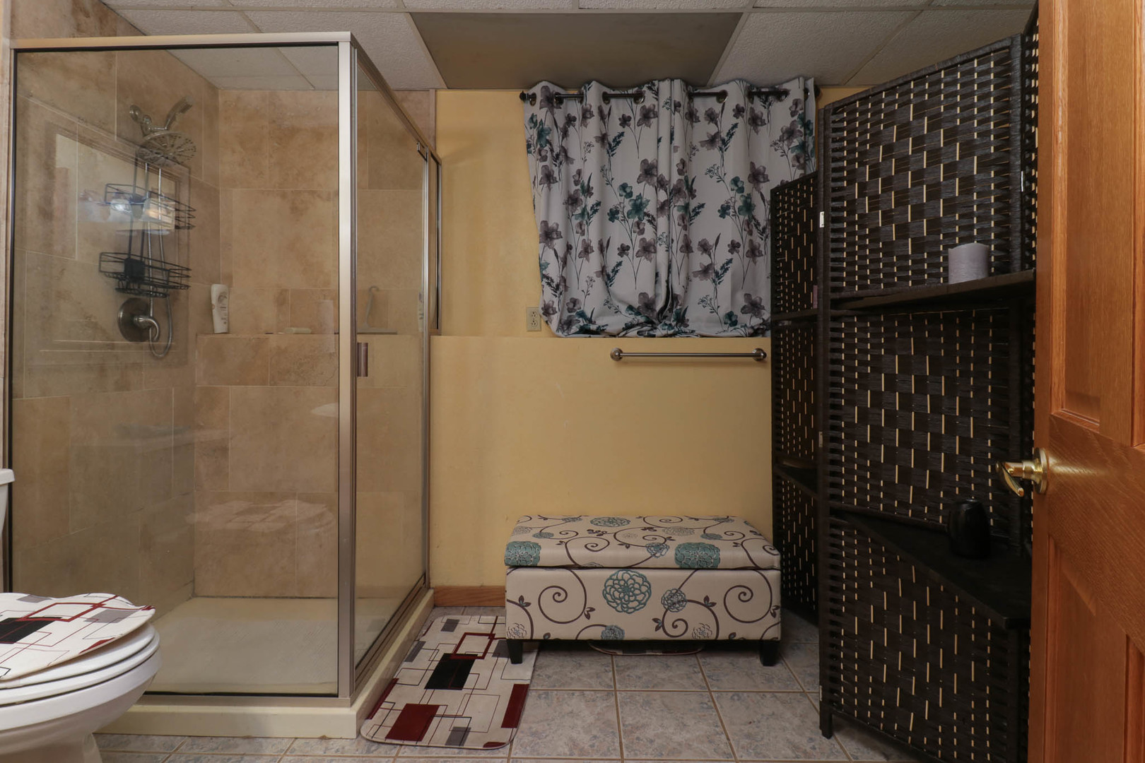 203 Edwards Drive Normal, IL 61761 - Photo 17 of 28 a bathroom with a toilet and a shower