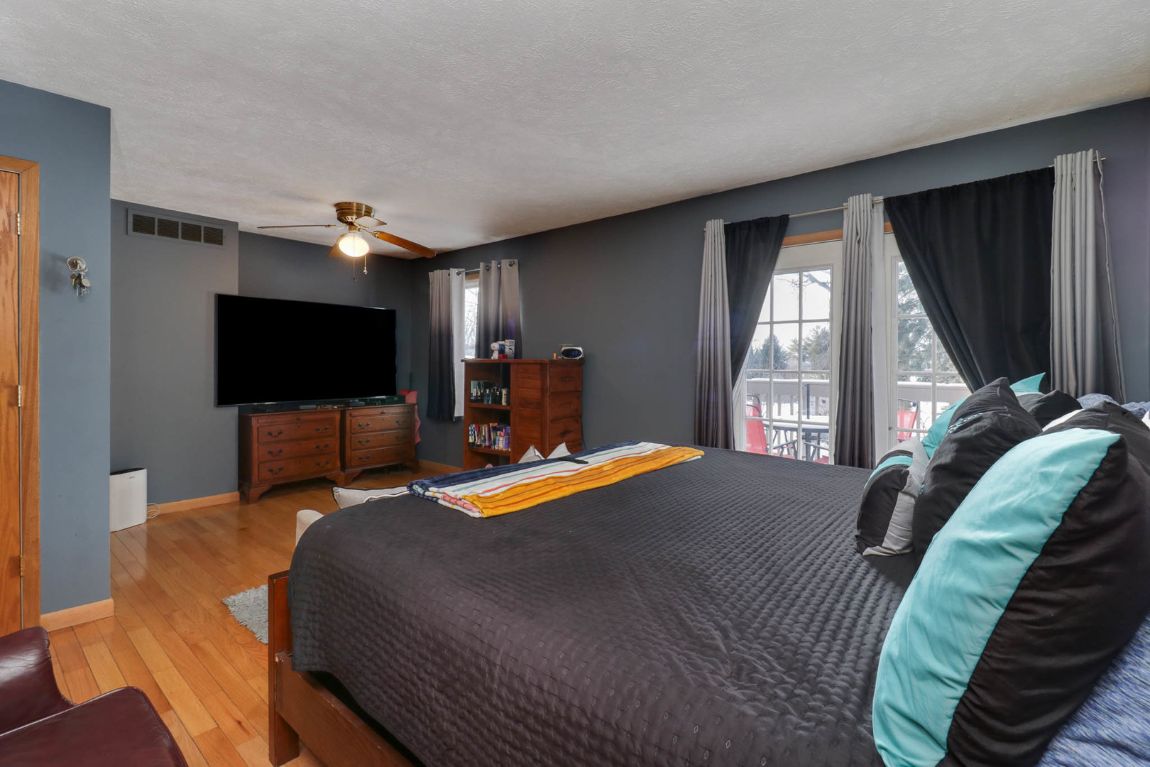 203 Edwards Drive Normal, IL 61761 - Photo 19 of 28 a bedroom with a bed and a flat screen tv