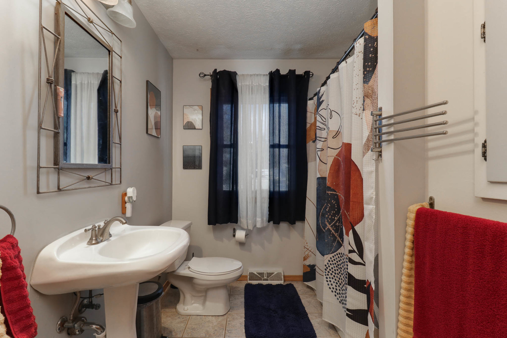 203 Edwards Drive Normal, IL 61761 - Photo 25 of 28 a bathroom with a sink toilet and shower