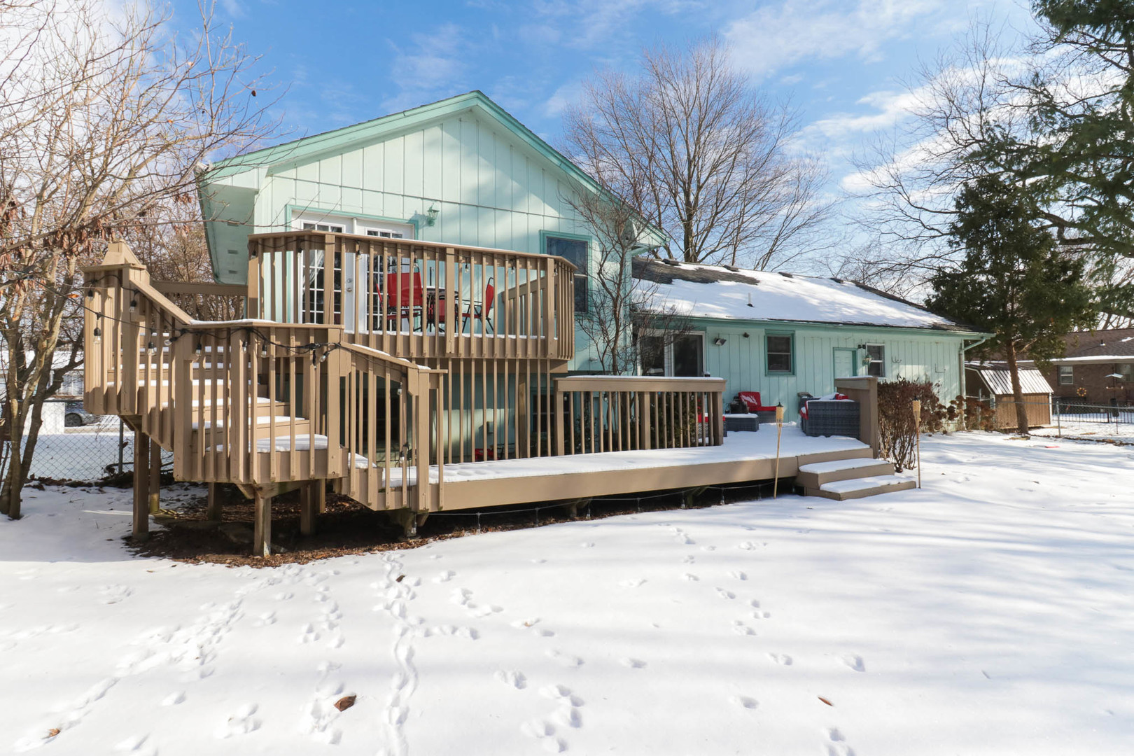 203 Edwards Drive Normal, IL 61761 - Photo 27 of 28 a view of a house with a yard and wooden deck