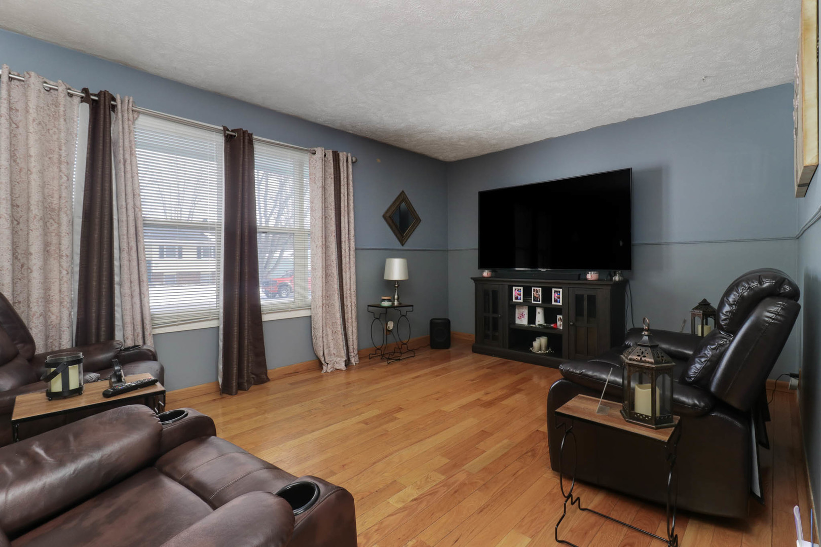 203 Edwards Drive Normal, IL 61761 - Photo 5 of 28 a living room with furniture and a flat screen tv