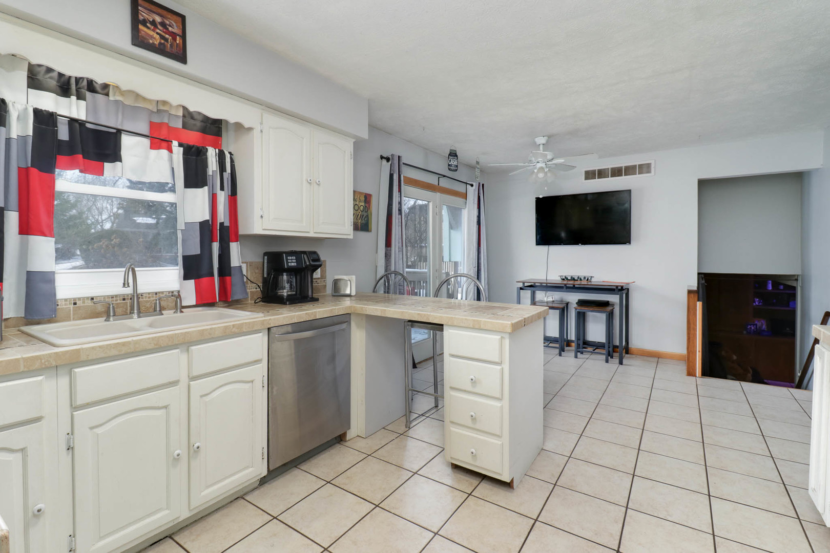 203 Edwards Drive Normal, IL 61761 - Photo 8 of 28 a kitchen with cabinets and chairs