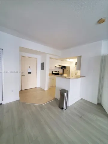 a view of kitchen with a sink