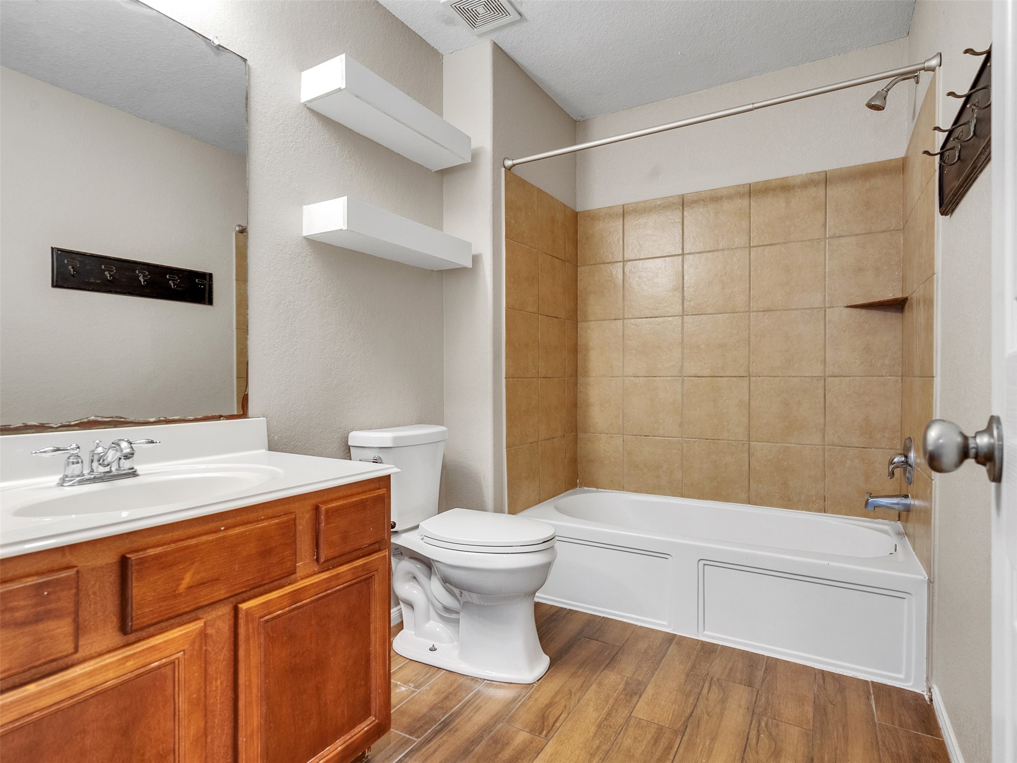 6014 Flagg Ranch Court Spring, TX 77388 - Photo 25 of 37 a bathroom with a sink toilet and shower