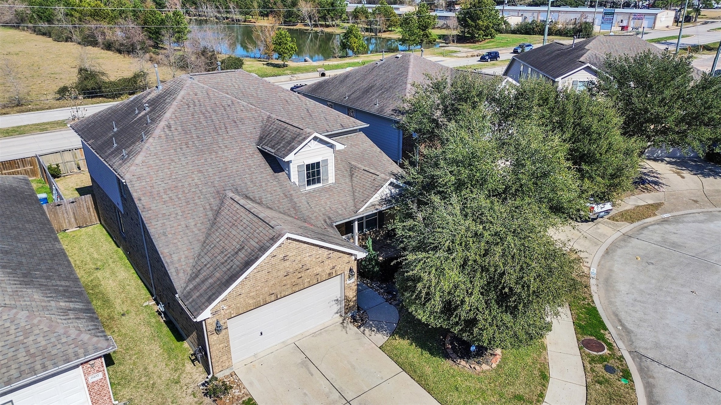 6014 Flagg Ranch Court Spring, TX 77388 - Photo 34 of 37 an aerial view of a house with outdoor space and lake view in back