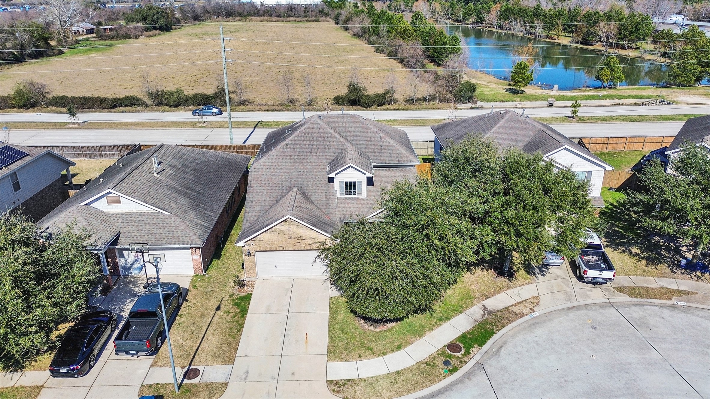 6014 Flagg Ranch Court Spring, TX 77388 - Photo 35 of 37 an aerial view of a house with a yard and lake view