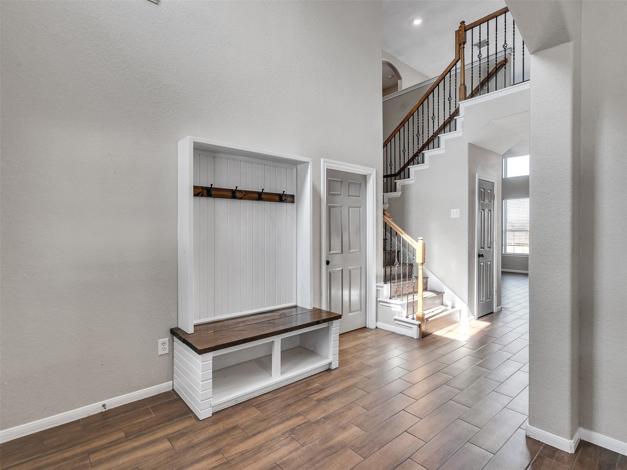6014 Flagg Ranch Court Spring, TX 77388 - Photo 6 of 37 a view of a room with wooden floor and stairs