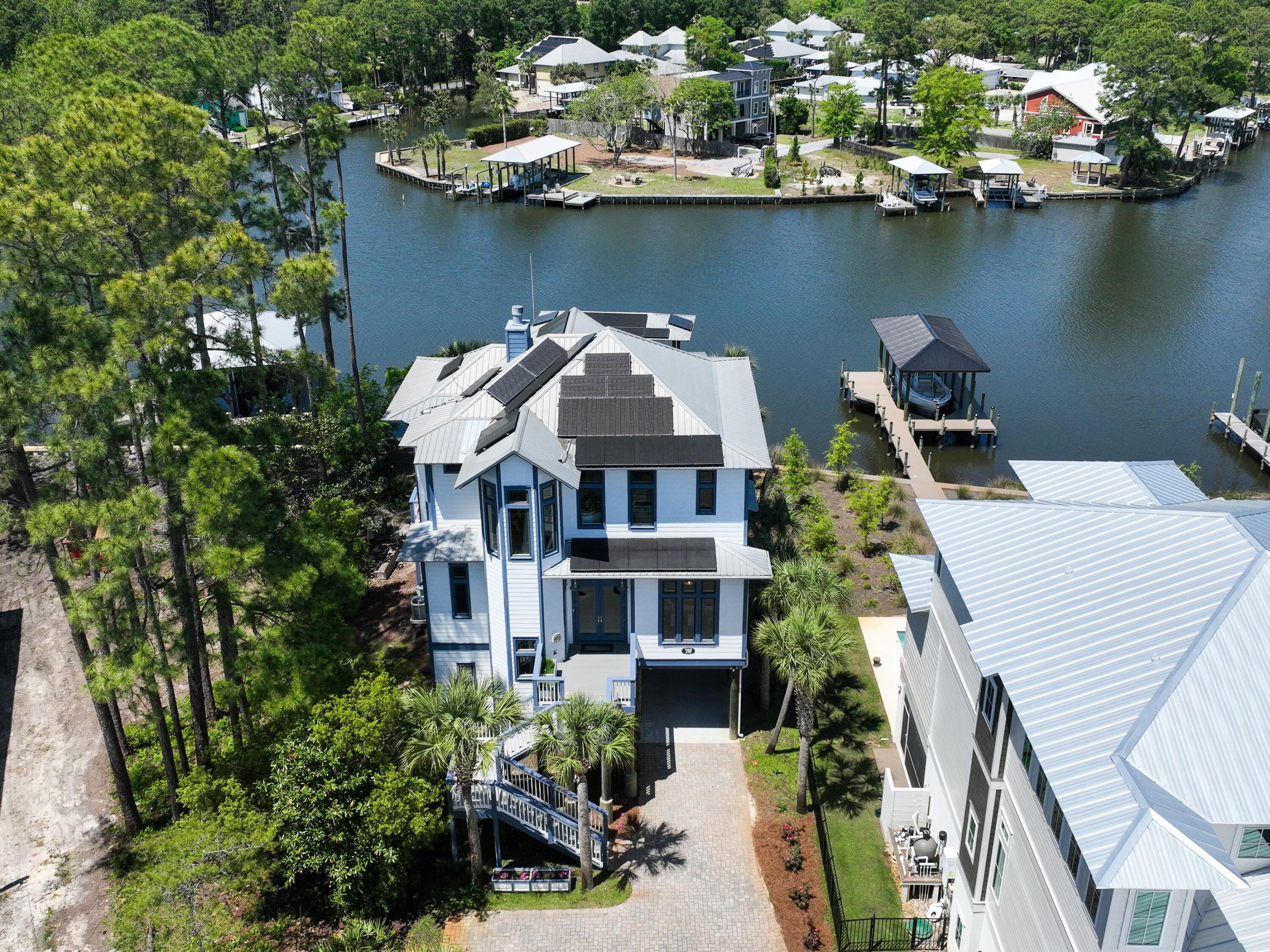 182 My Way Santa Rosa Beach, FL 32459 - Photo 2 of 39 an aerial view of a house with a lake view