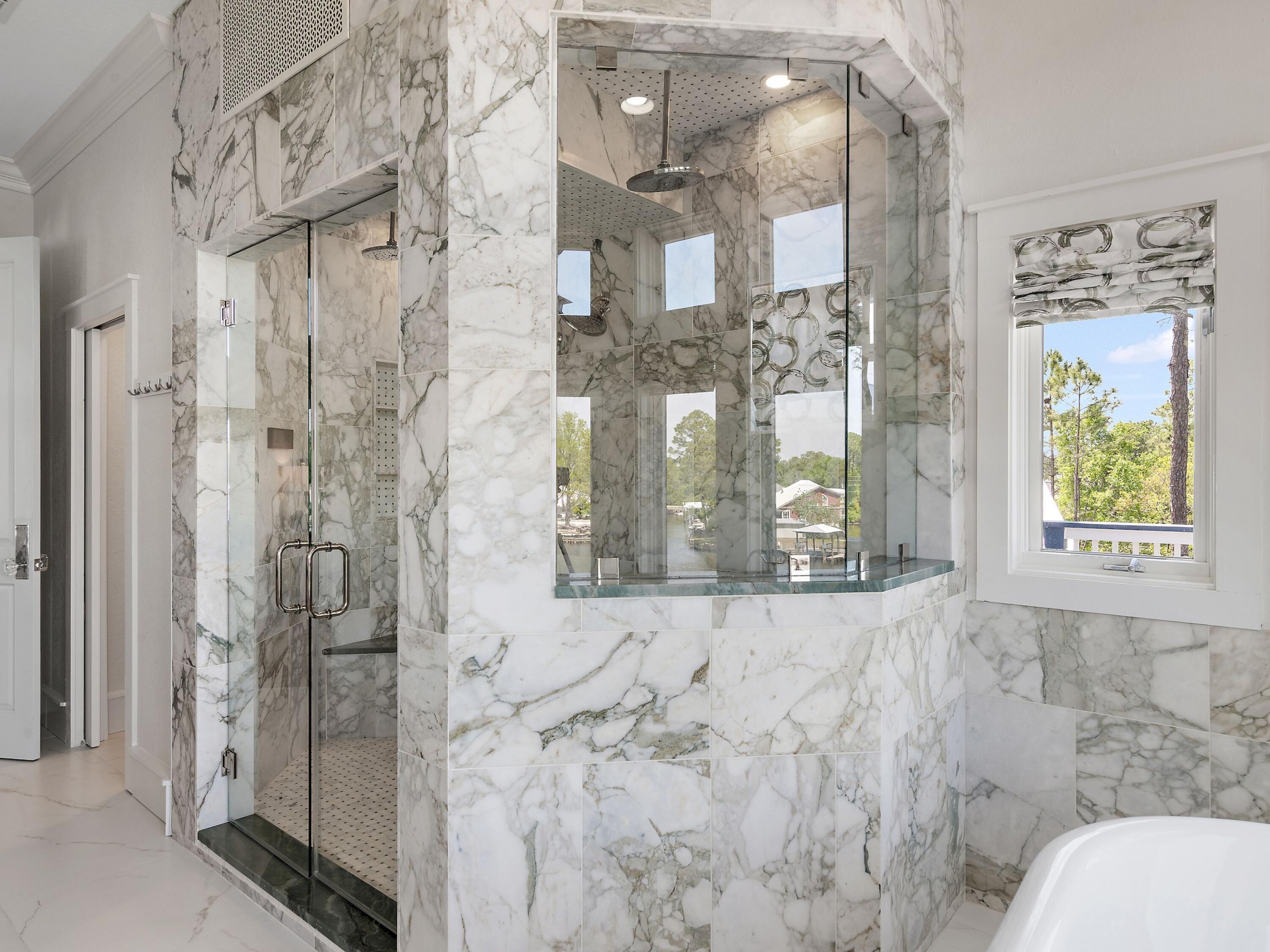 182 My Way Santa Rosa Beach, FL 32459 - Photo 23 of 39 a bathroom with a shower